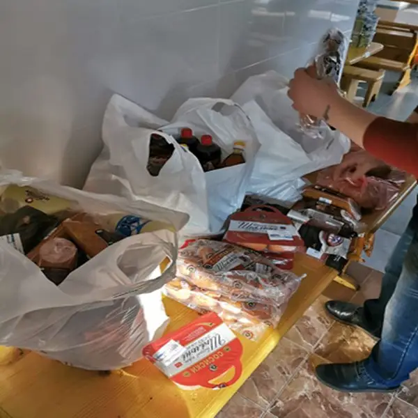 Boxes of donated food supplies at a Ukrainian refugee centre.