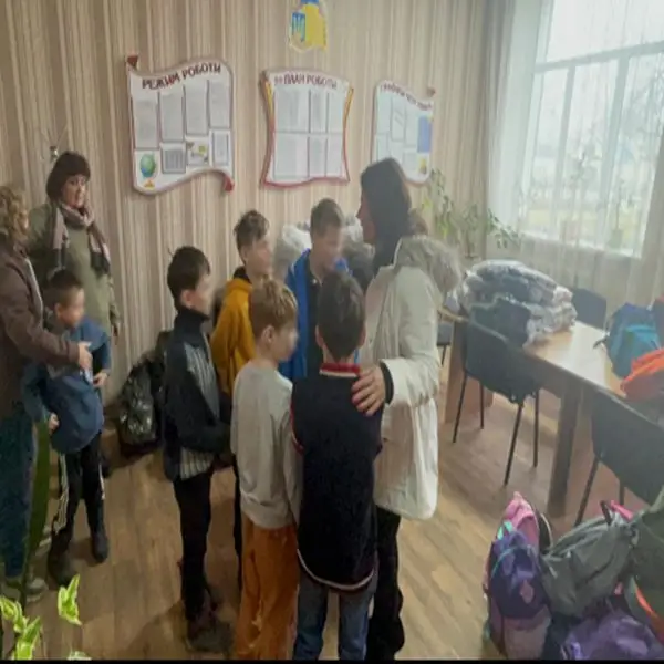 Children at a Ukrainian orphanage receiving donated supplies.